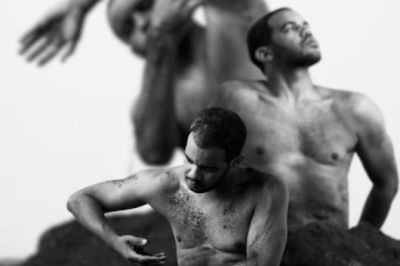 3 layered images of young man with bare torso in motion